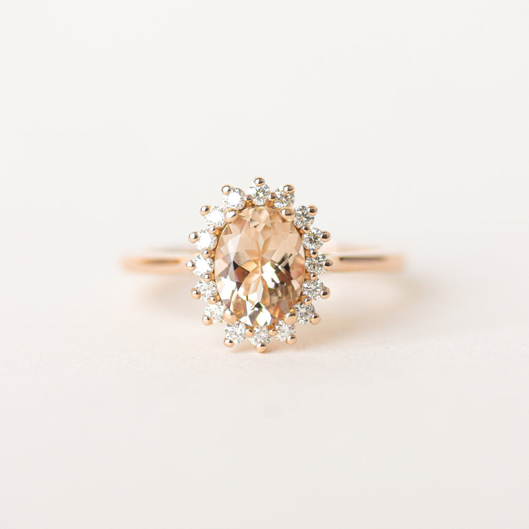 Peach Oval Sapphire Halo Engagement Ring