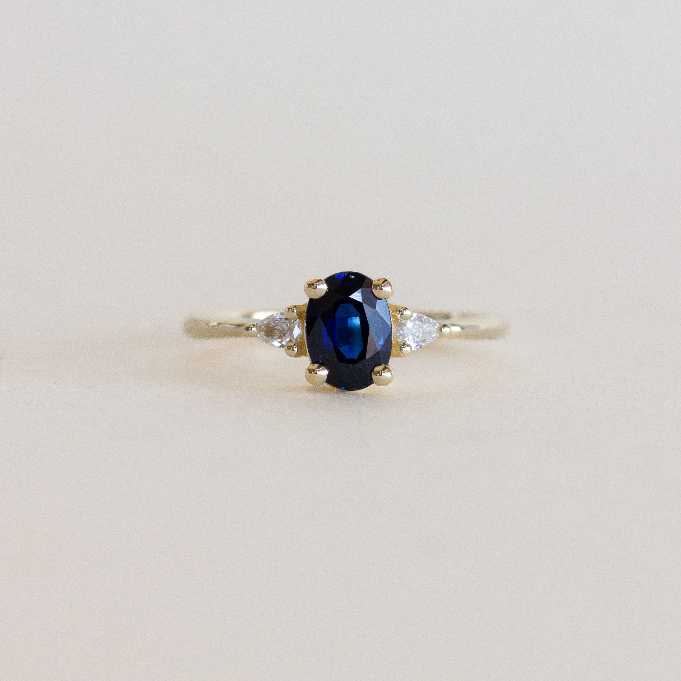 Oval Sapphire Pear Sides Engagement Ring