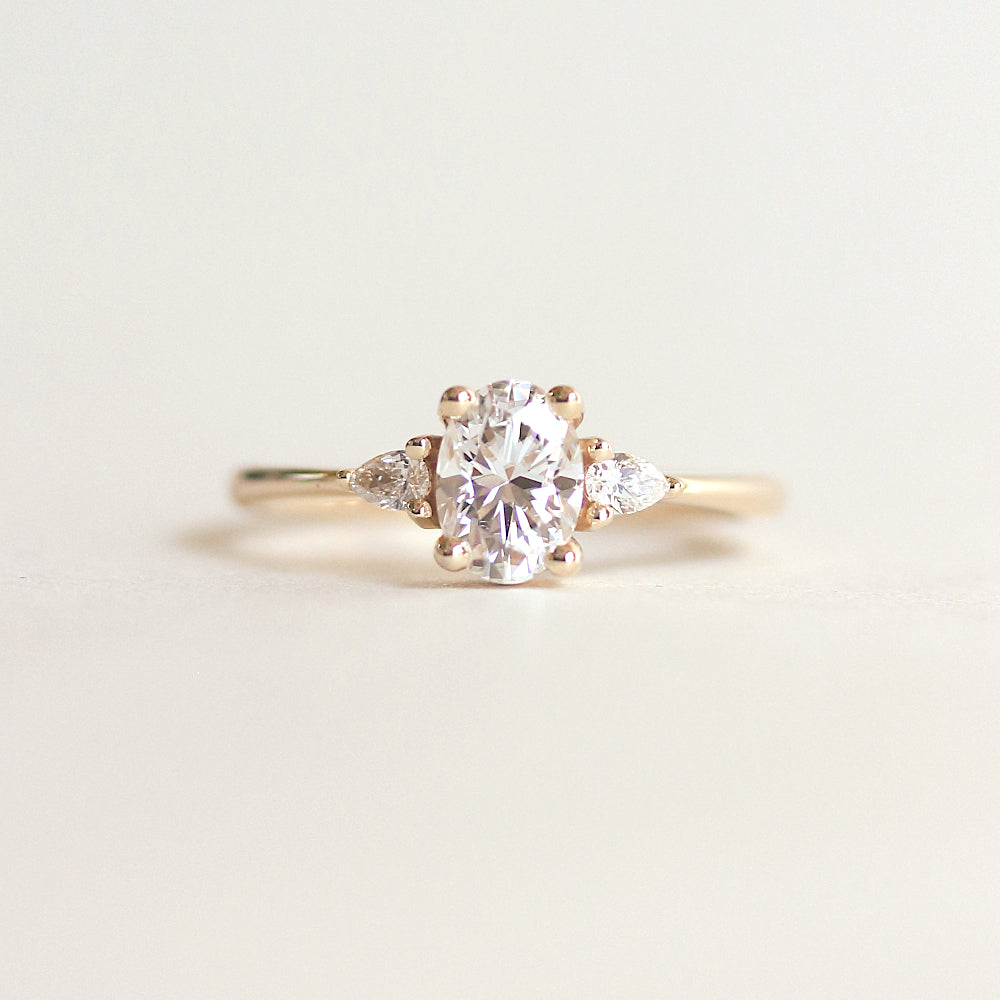 White Oval Stone Pear Sides Engagement Ring