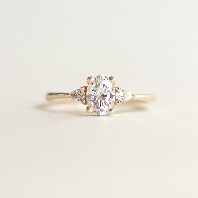 White Oval Stone Pear Sides Engagement Ring