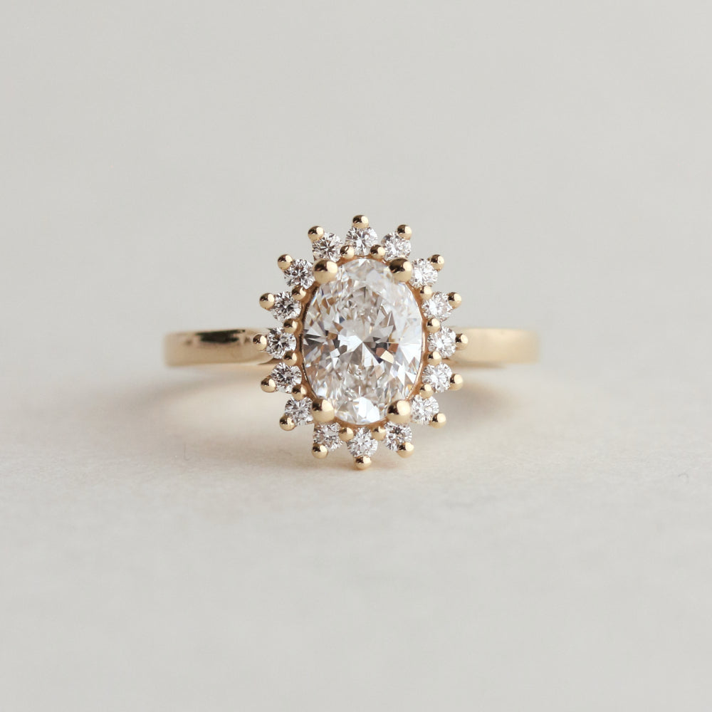 White Oval Stone Halo Engagement Ring