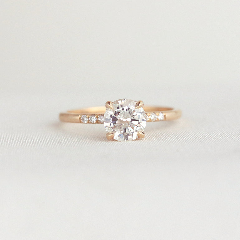 Round Diamond Side Stone Engagement Ring