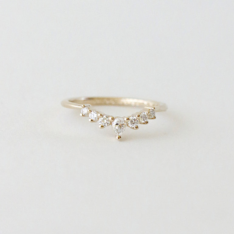 contour diamond wedding band with pear diamond