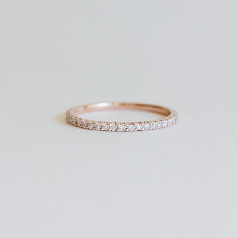 pave diamond eternity style wedding band