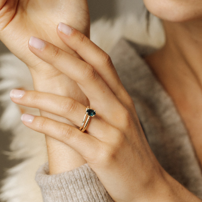 diamond galaxy wedding band with engagement ring on models hand