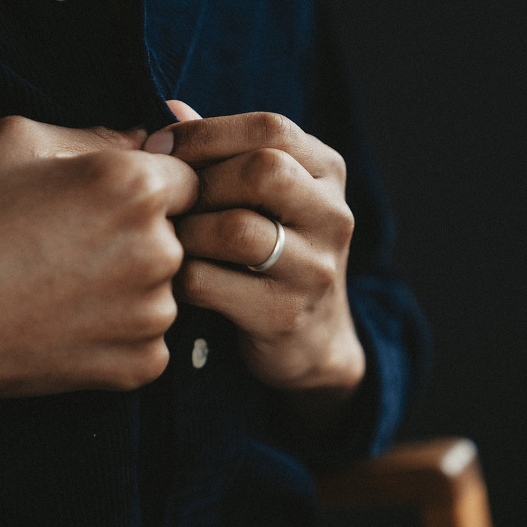 half round wedding band on mens hand