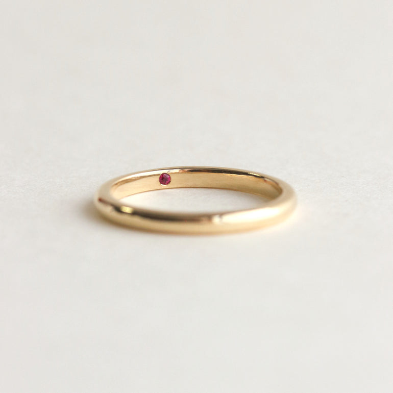 hidden birthstone thin wedding band